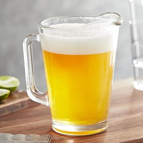 Glass pitcher jug perfect for serving water, juice, or beer.