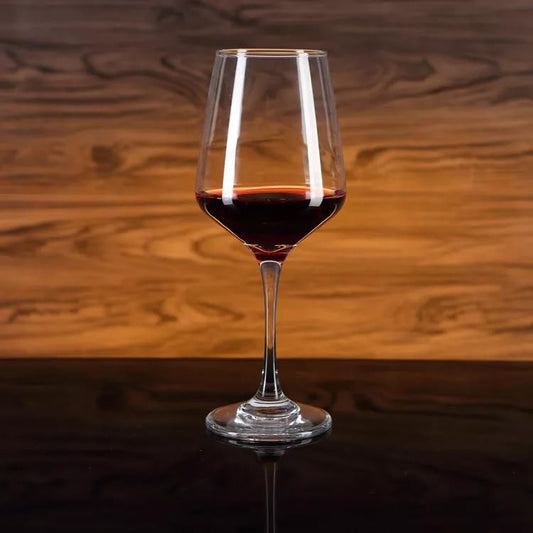 Premium crystal wine glass filled with red wine.
