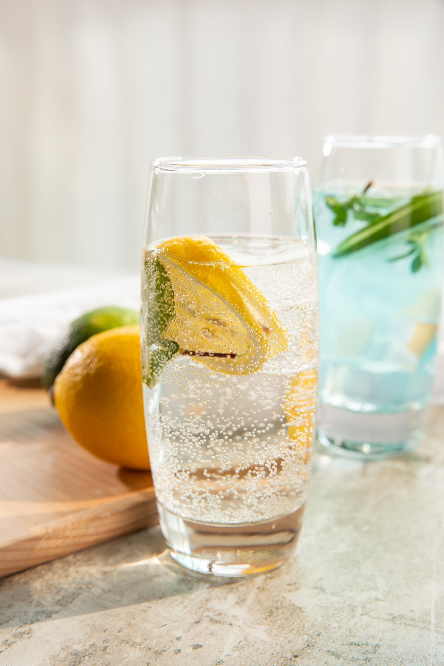 Refresh Glass with a bubbly soda and a wedge of lime.