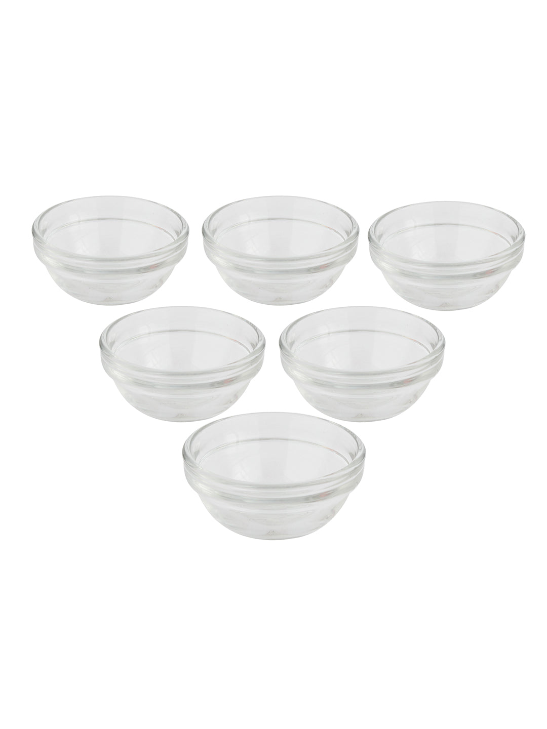 Clear glass bowls stacked and ready for serving chutneys.