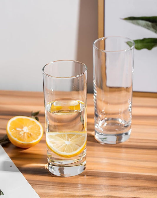 Eco-friendly water and juice glasses on table