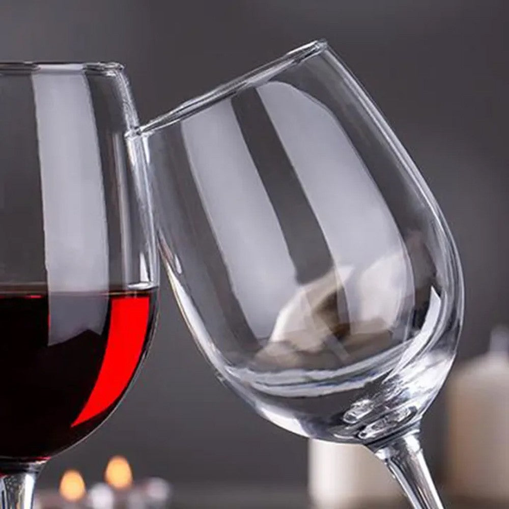 Wine glass set on a table for a casual dinner.