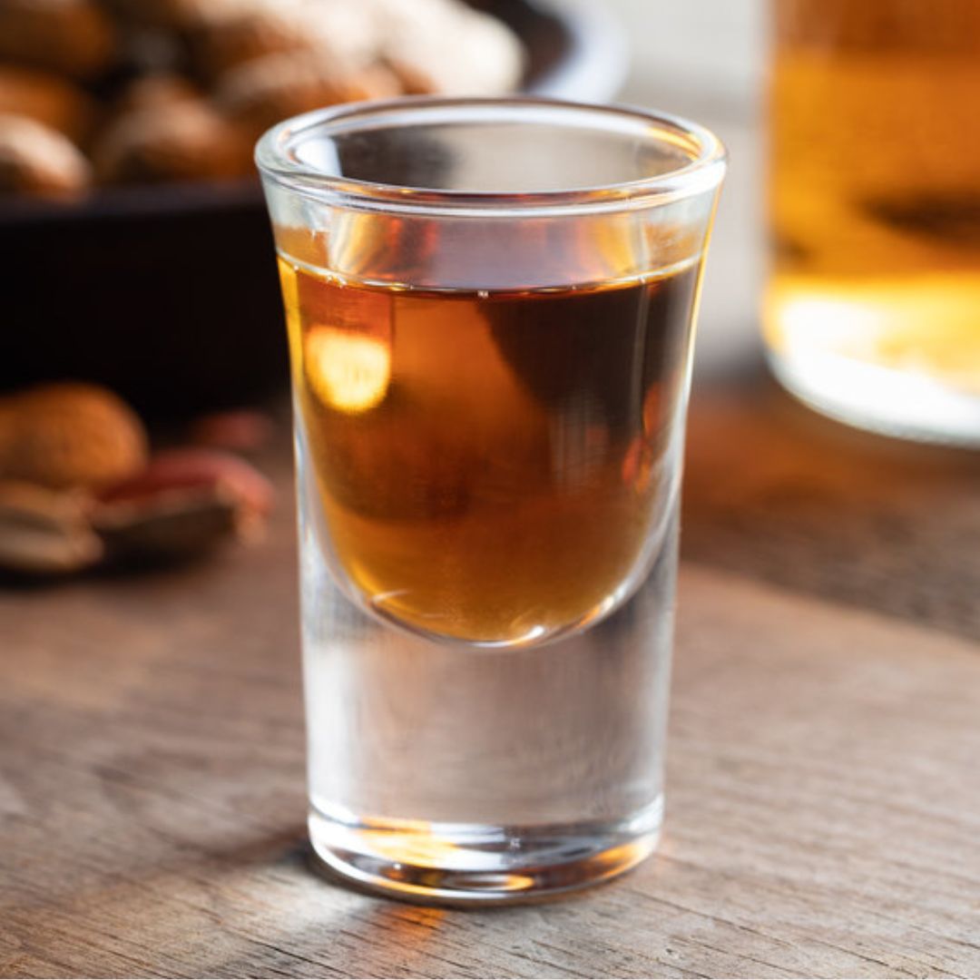 Close-up of Cheerio Shot Glass with tequila inside