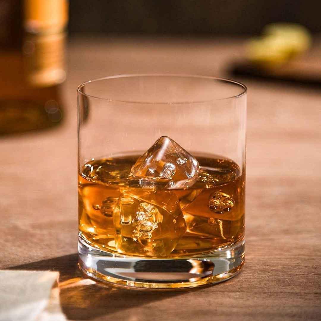 Elegant whiskey glass enhancing complex whiskey aromas