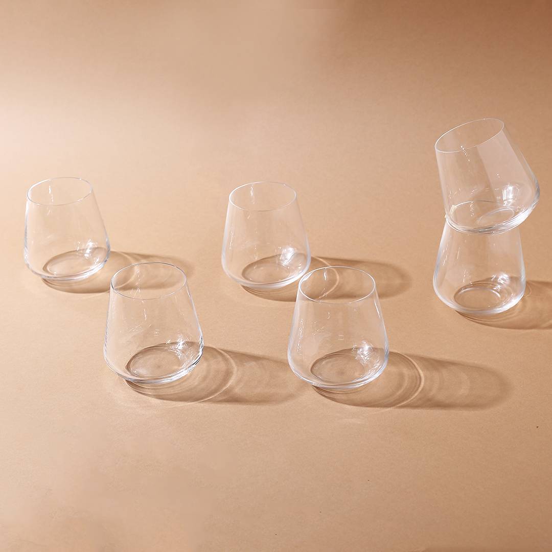 Set of Sandra Whiskey Glasses arranged for a dinner party.