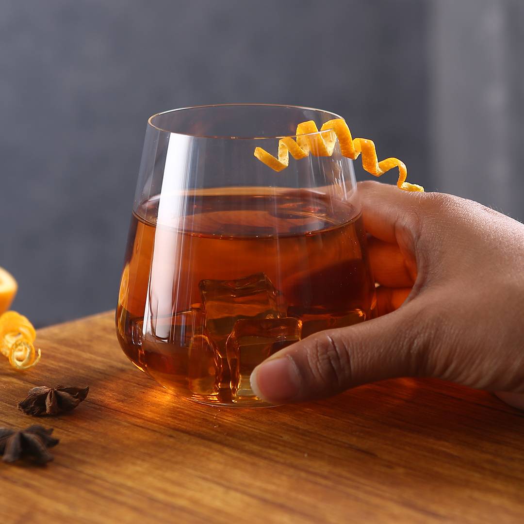 Hand holding Sandra Whiskey Glass comfortably.