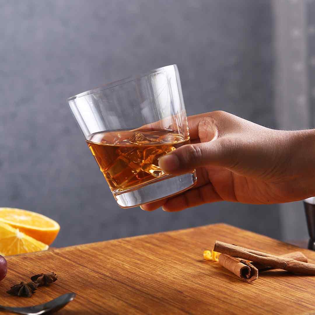 Expertly crafted frosted whiskey glass with wide mouth