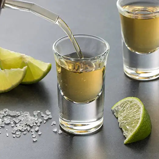 Cheerio Shot Glass filled with vodka and lime wedge