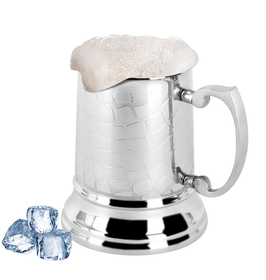 Grid double wall stainless steel beer mug filled with cold beer.