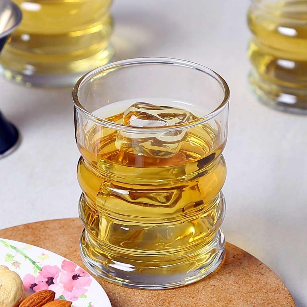 Twist Whiskey Glass featuring unique spiral design.