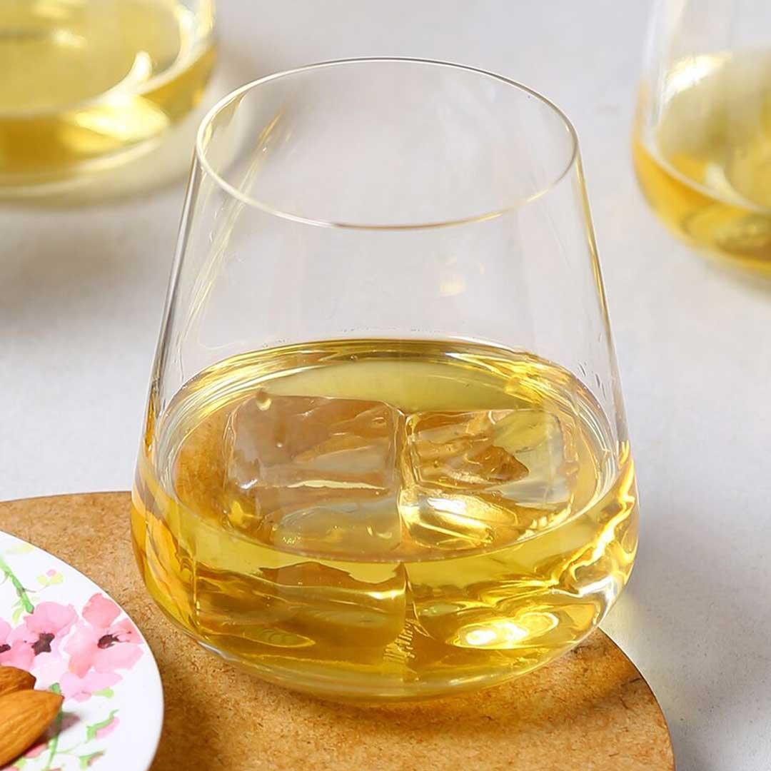 Close-up of Whiskey Glass showcasing its tapered mouth and rounded bowl
