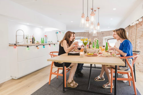 Colored Glass Returns to Favor in Modern Dining Rooms