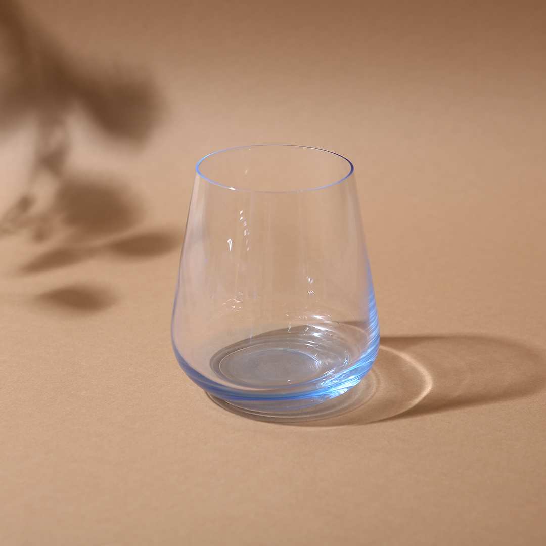 Elegant whiskey glass with wide bowl enhancing whiskey aromas