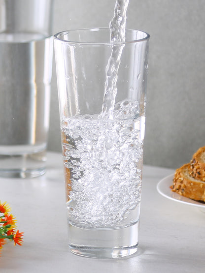 Water being filled in a crystal clear highball glass