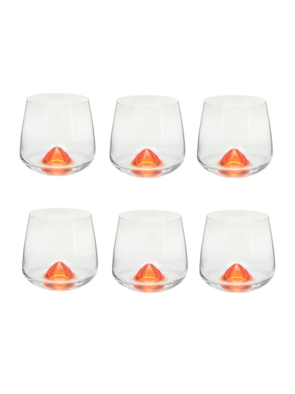 Elegant whiskey glass with bright orange base and clear bowl