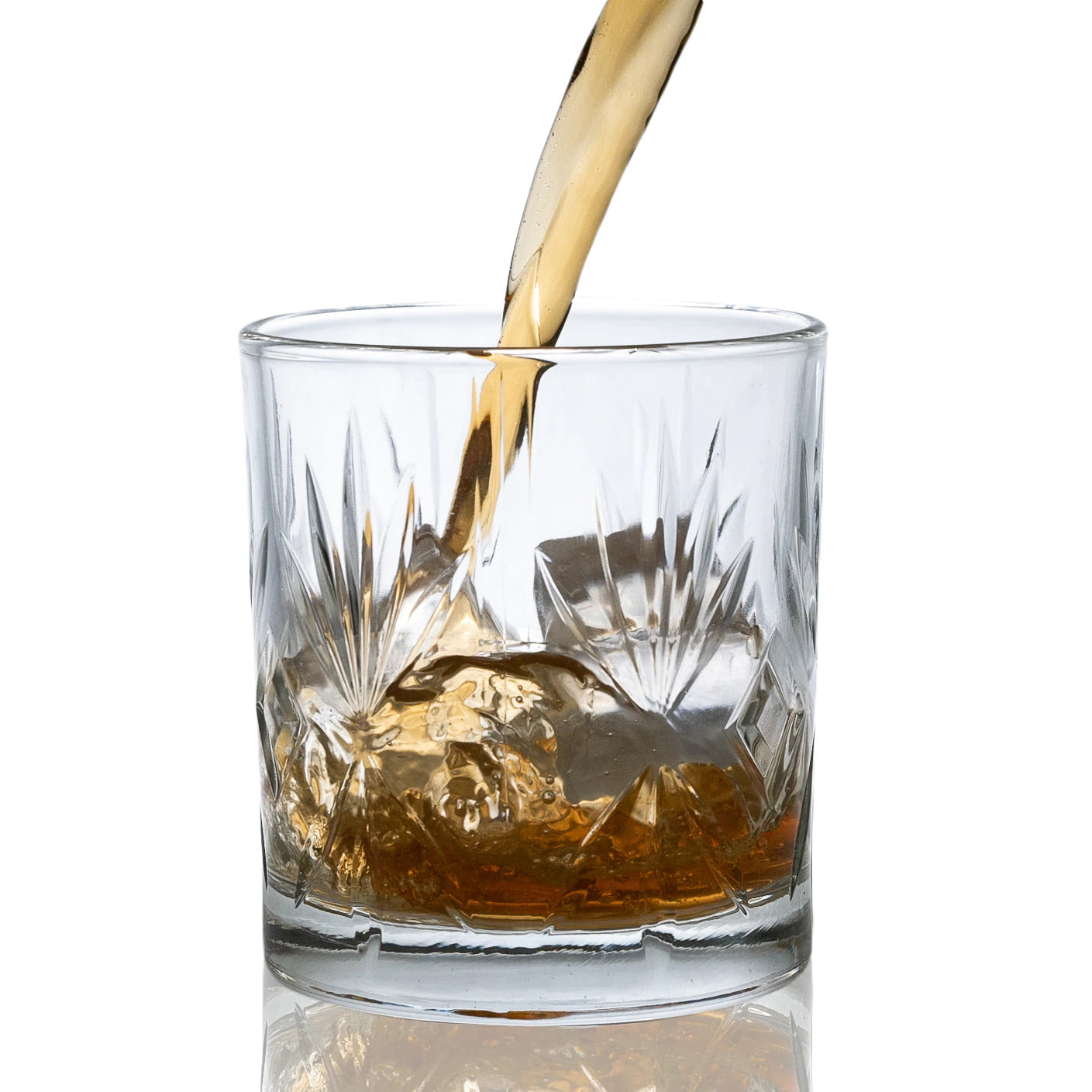 Angle shot showing the substantial base and elegant contour of the  Crystal Whiskey Glass.