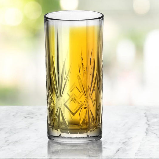 Close-up of a highball glass filled with a refreshing drink.
