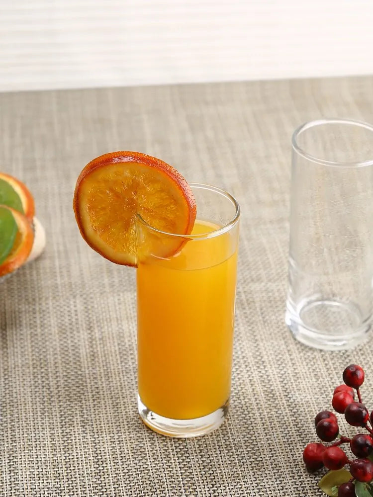 Juice Tumbler filled with Orange juice with garnish