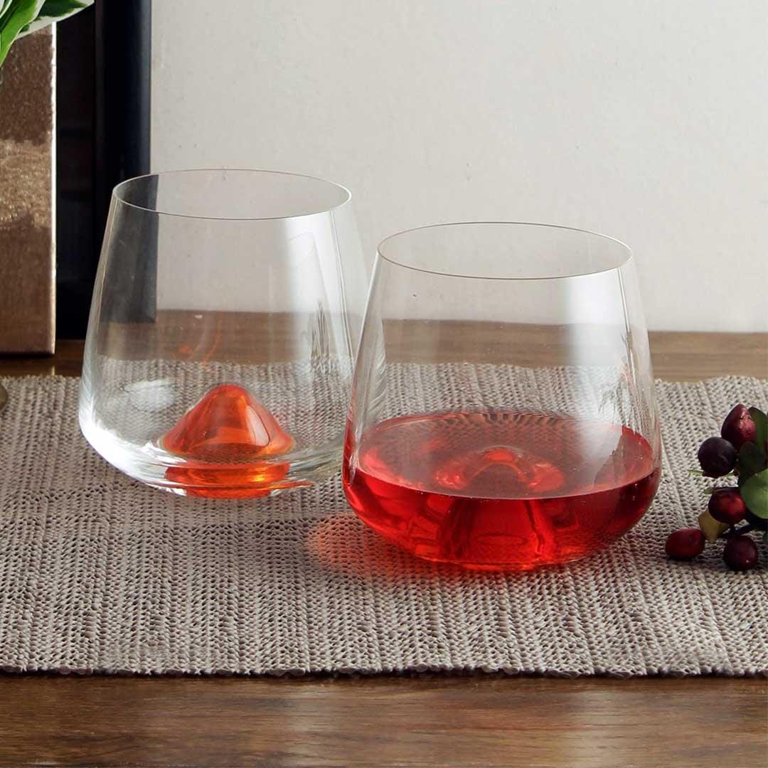 High-quality lead-free crystal whiskey glass with vibrant orange base