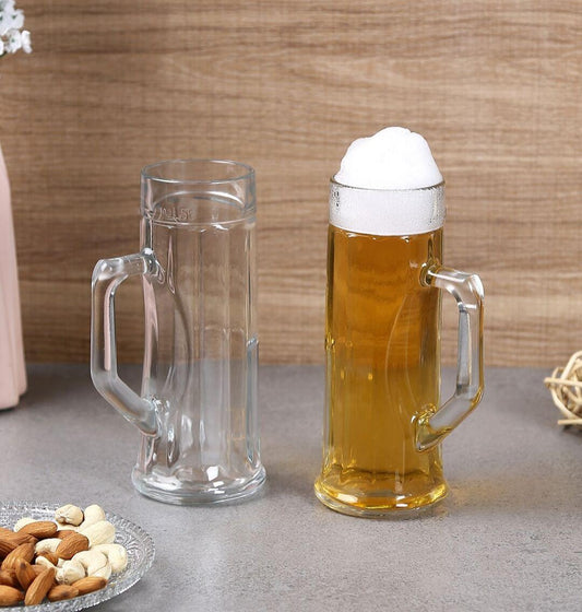 Premium Ribbed Beer Mug filled with golden beer on a bar counter.